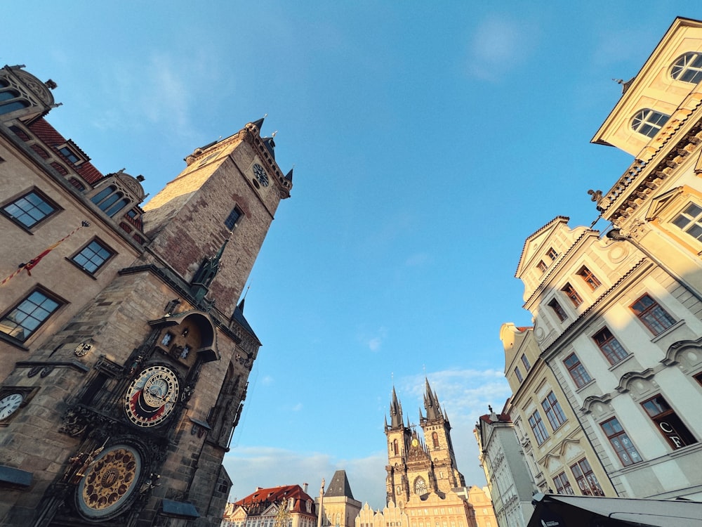 a large clock tower towering over a city