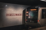 a subway train pulling into a subway station