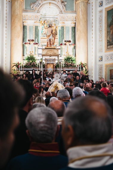 A warm gathering of parishioners during a Sunday mass inside the church.