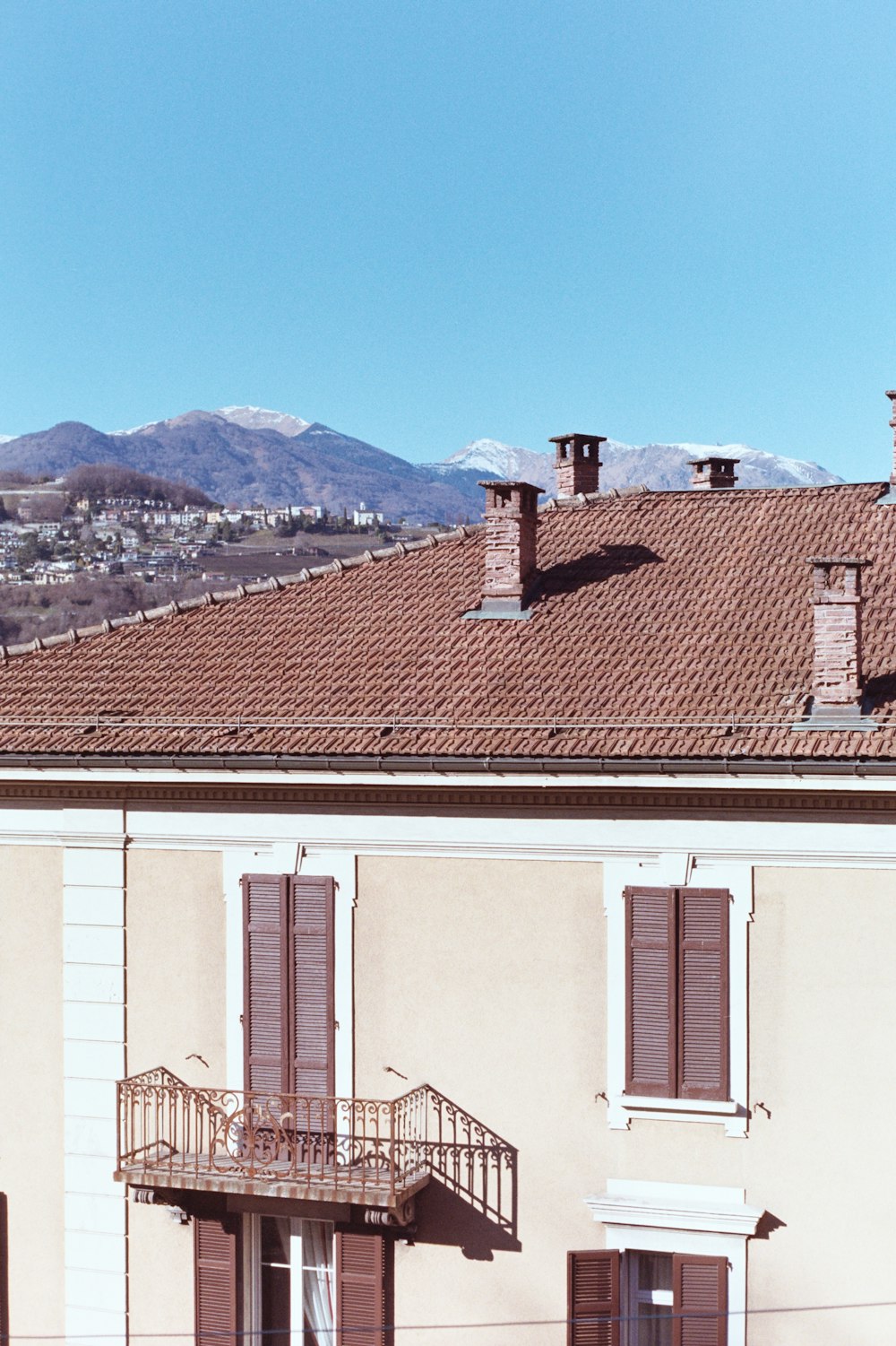 a view of a building with a clock on the front of it