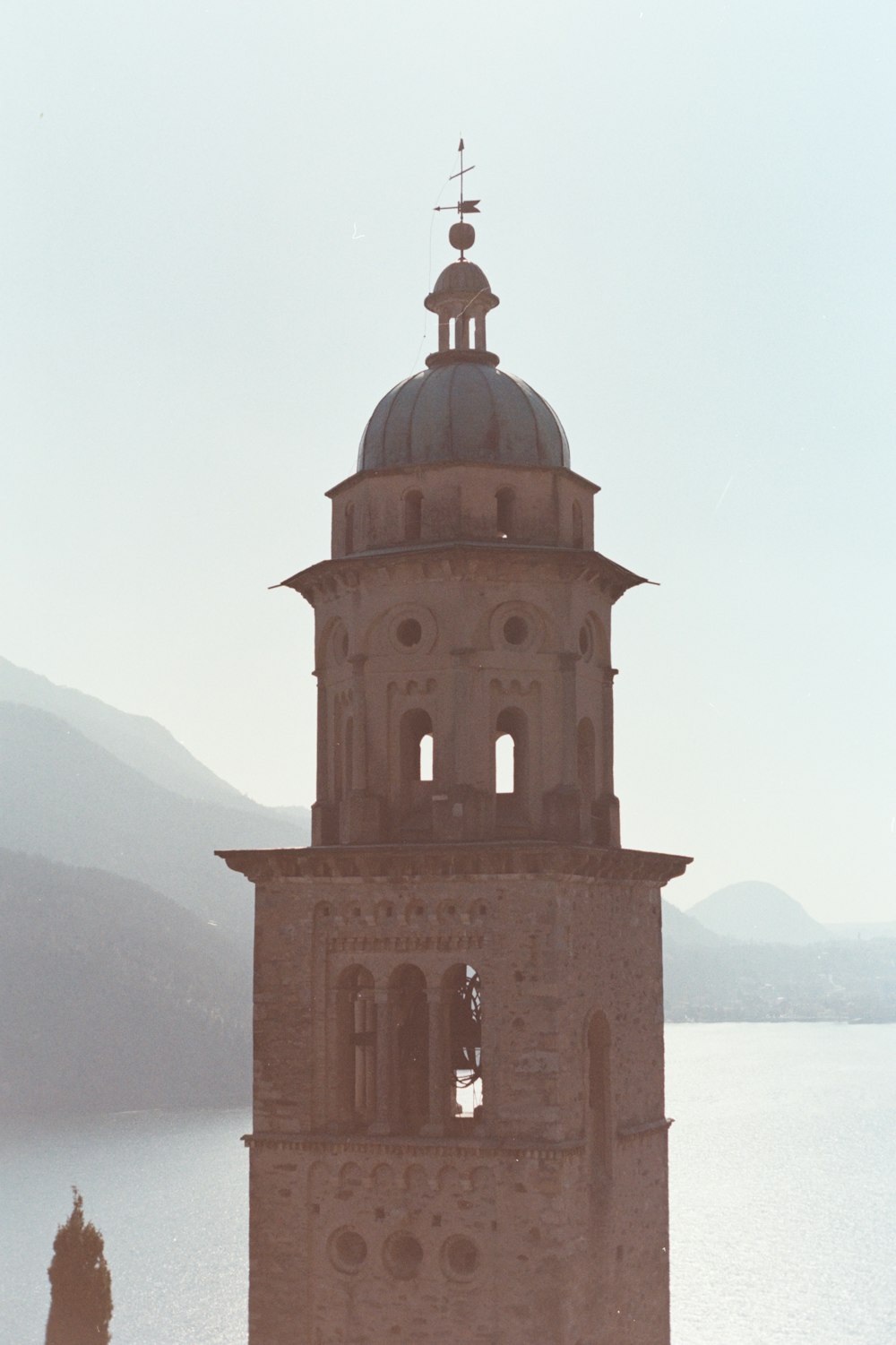 a tall tower with a clock on the top of it