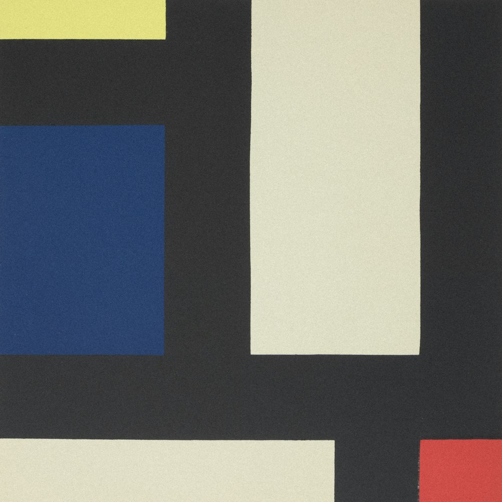 a black, white, red, yellow and blue painting