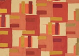 An abstract art piece composed of rectangular shapes in varying shades of red, orange, mustard yellow, and beige. The geometric forms are arranged in a seemingly random pattern, creating a sense of movement and rhythm across the canvas.