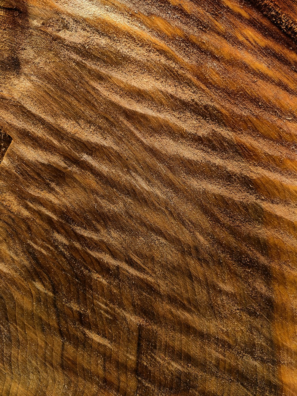 a piece of wood that is brown and brown