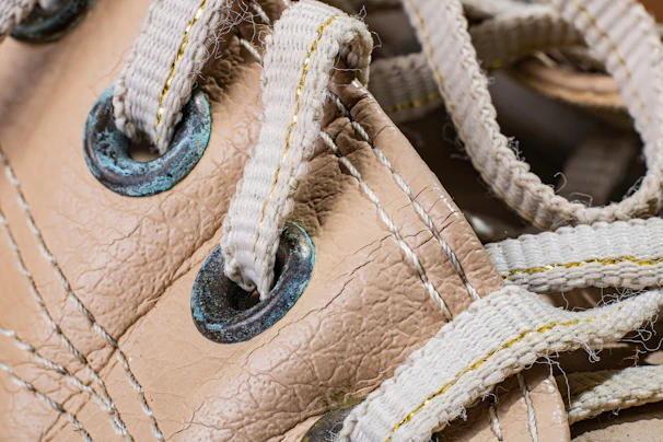 Damaged heel of a classic men's shoe before repair, highlighting cracks