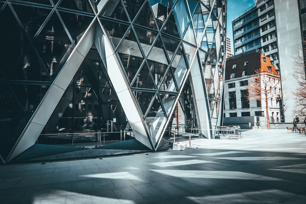 a large building with a triangular design on the side of it