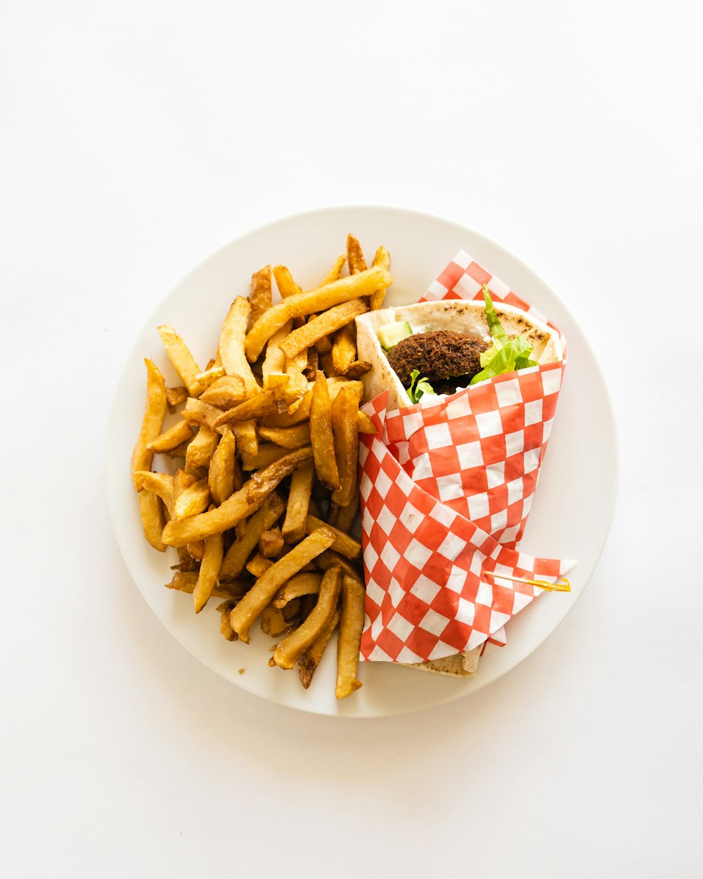 a plate with a sandwich and fries on it