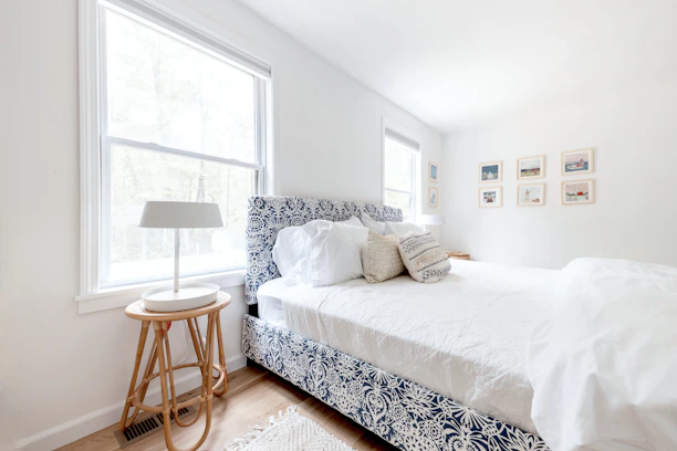 Bright and welcoming bedroom in a vacation rental, styled to attract guests.