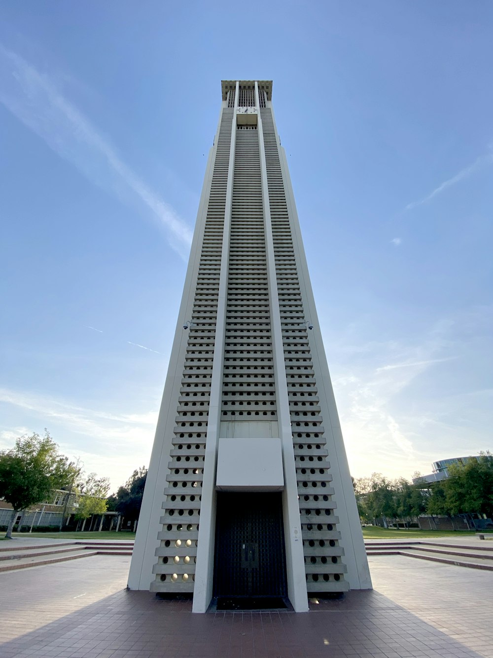 a tall tower with a clock on the top of it