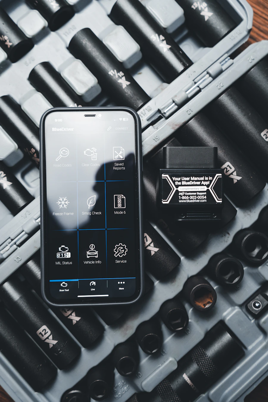 Smartphone resting on a mechanic's toolbox &mdash; the only equipment you need to start documenting and blogging about your repairs