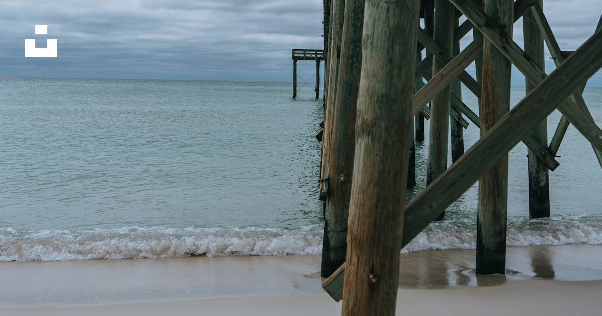 A view of the ocean from underneath a pier photo – Free Panama city
