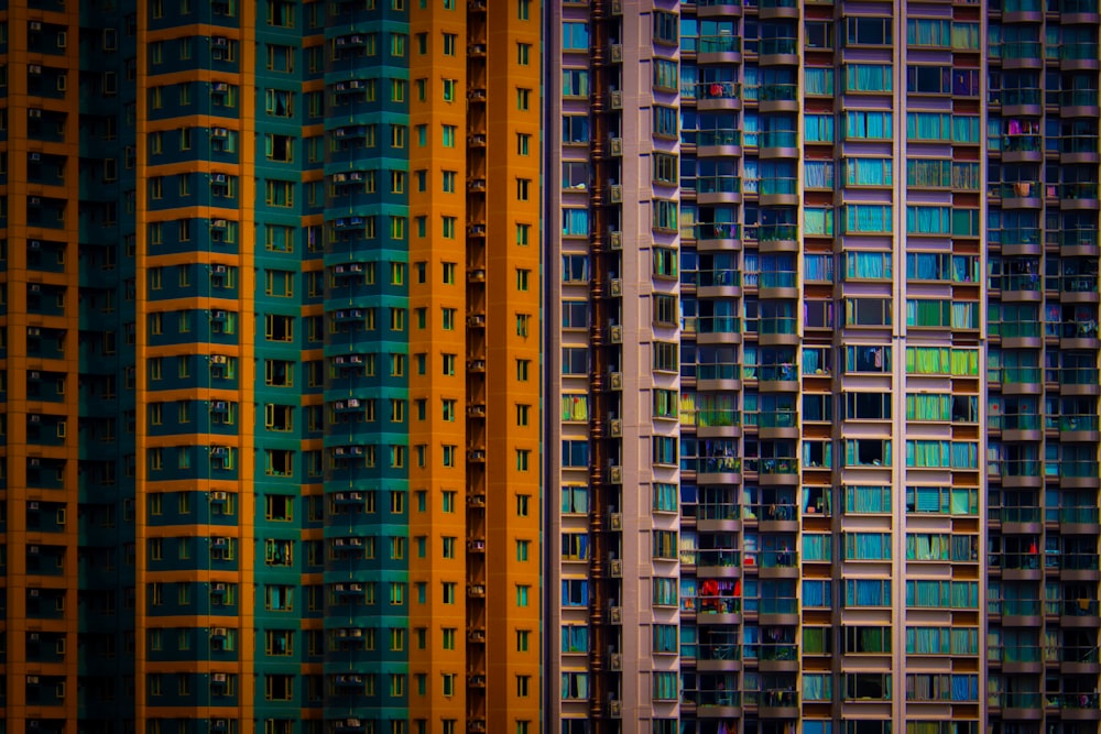 a row of multicolored buildings in a city