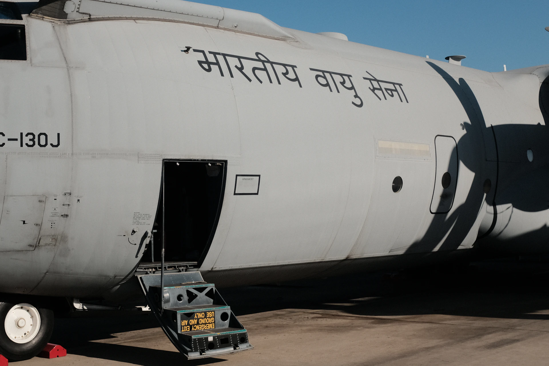 a large jetliner sitting on top of an airport tarmac