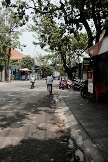 A modern mobility scene showing an e-bike on a quiet urban street with muted colors.