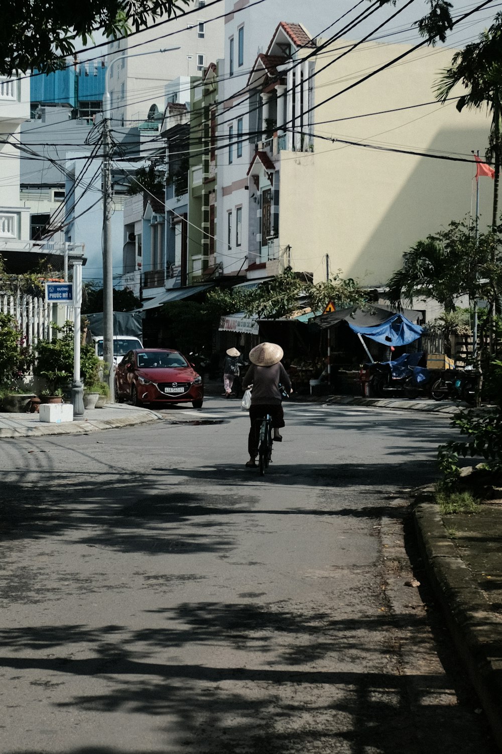 a person riding a motorcycle down a street