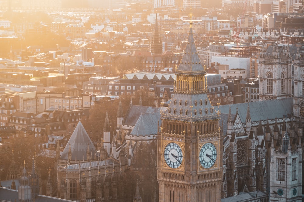 a large clock tower towering over a city