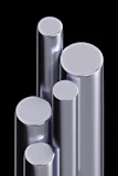 Close-up of shiny steel bars bundled together, highlighting their strength and quality.
