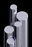Close-up of shiny steel bars bundled together, highlighting their strength and quality.