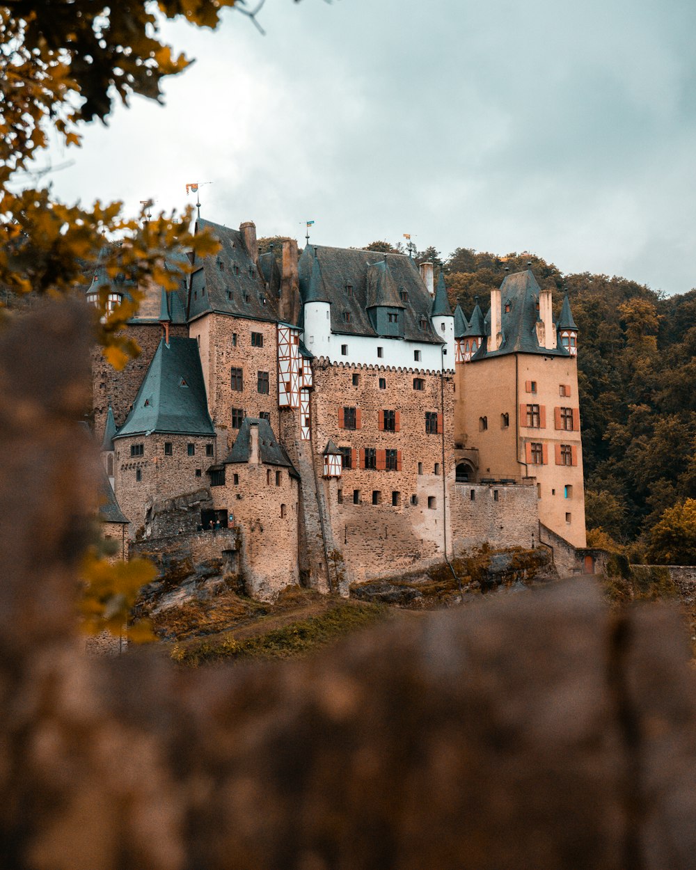 a castle with a clock on the top of it