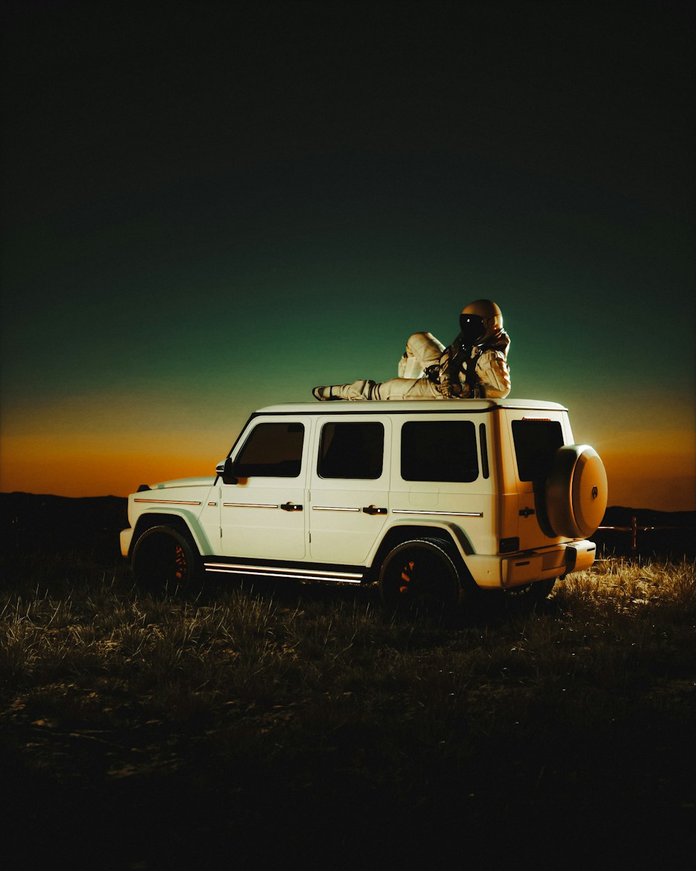 a white jeep with a person sitting on top of it