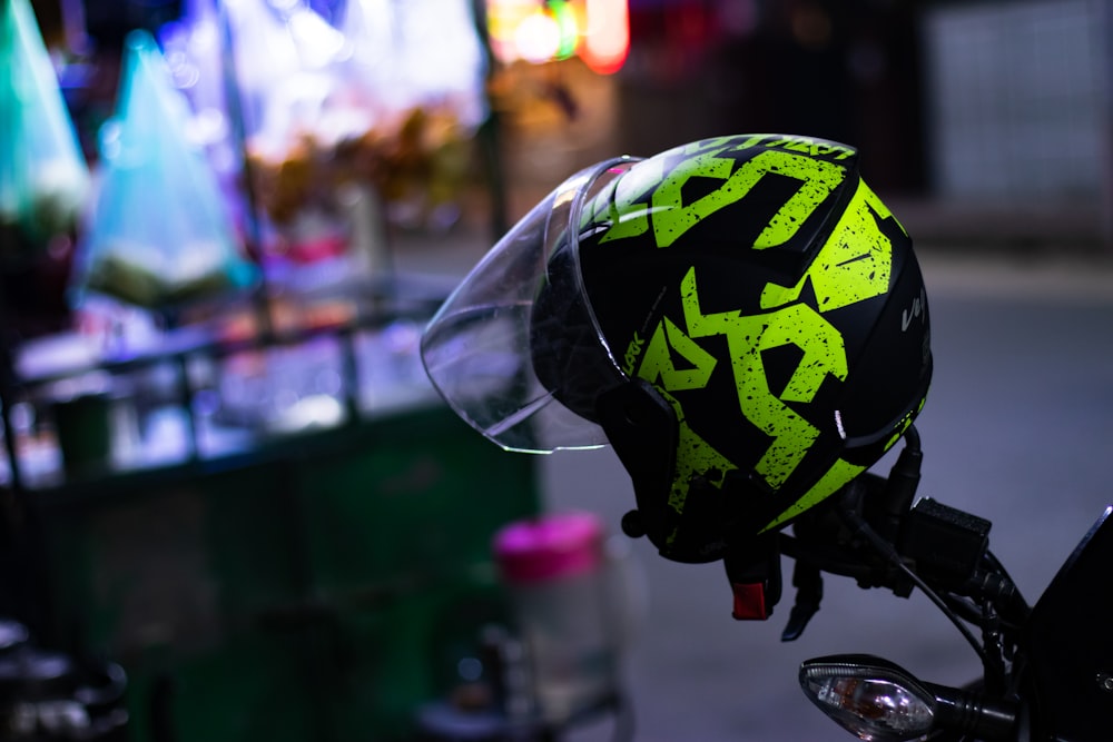 a helmet on the back of a motorcycle