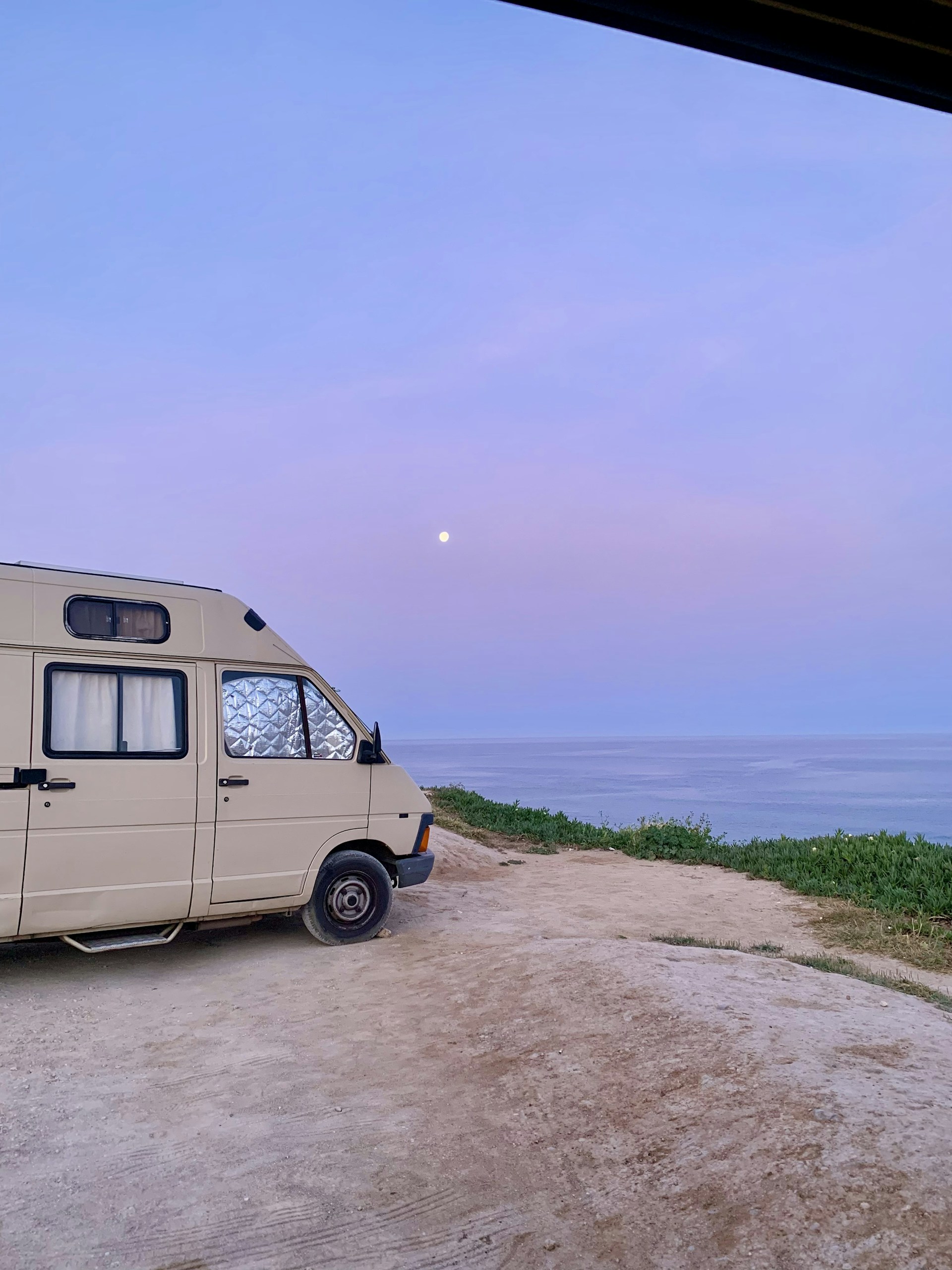 woman wearing yellow long-sleeved dress under white clouds and blue sky during daytime