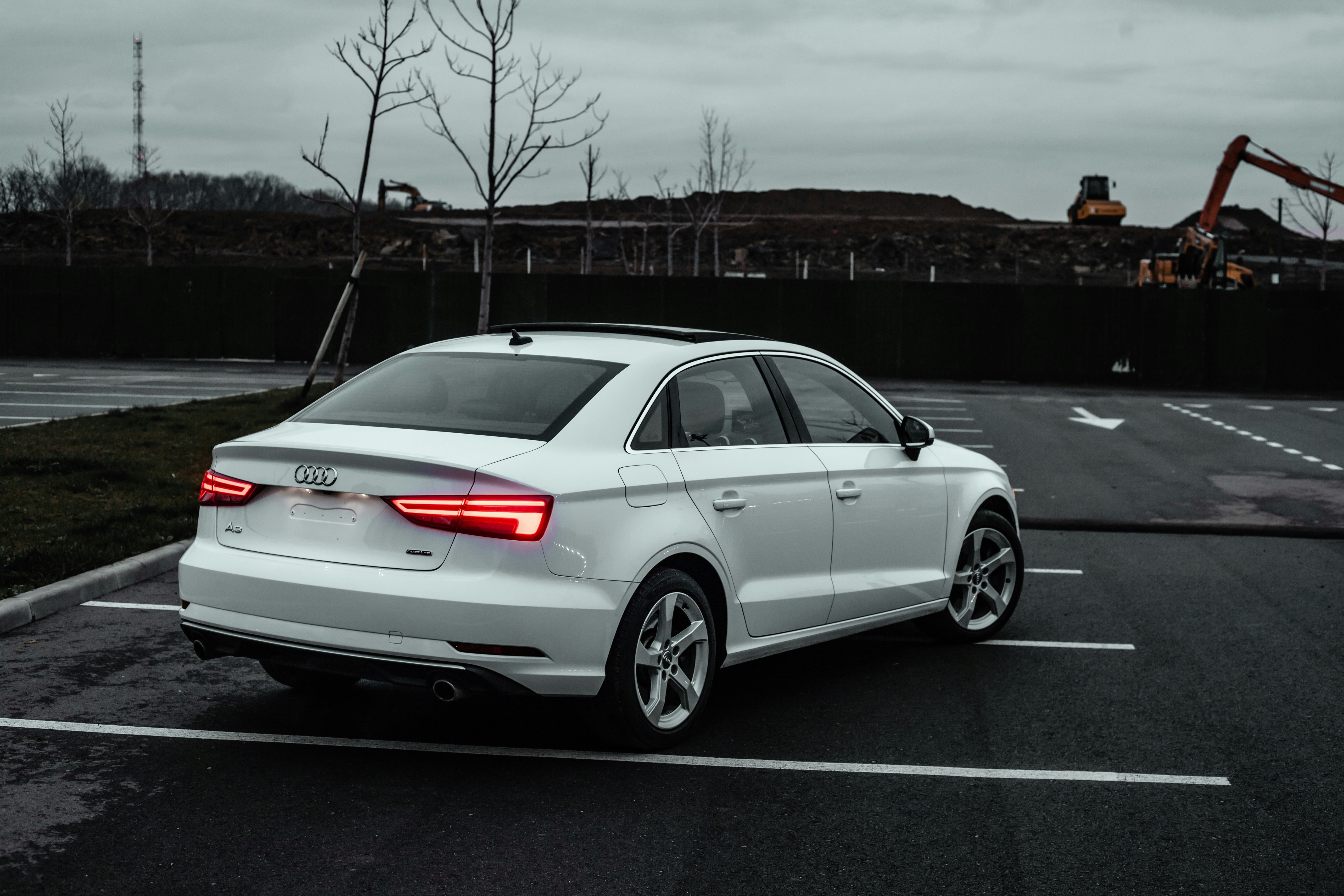 A white Audi R8 sports car.