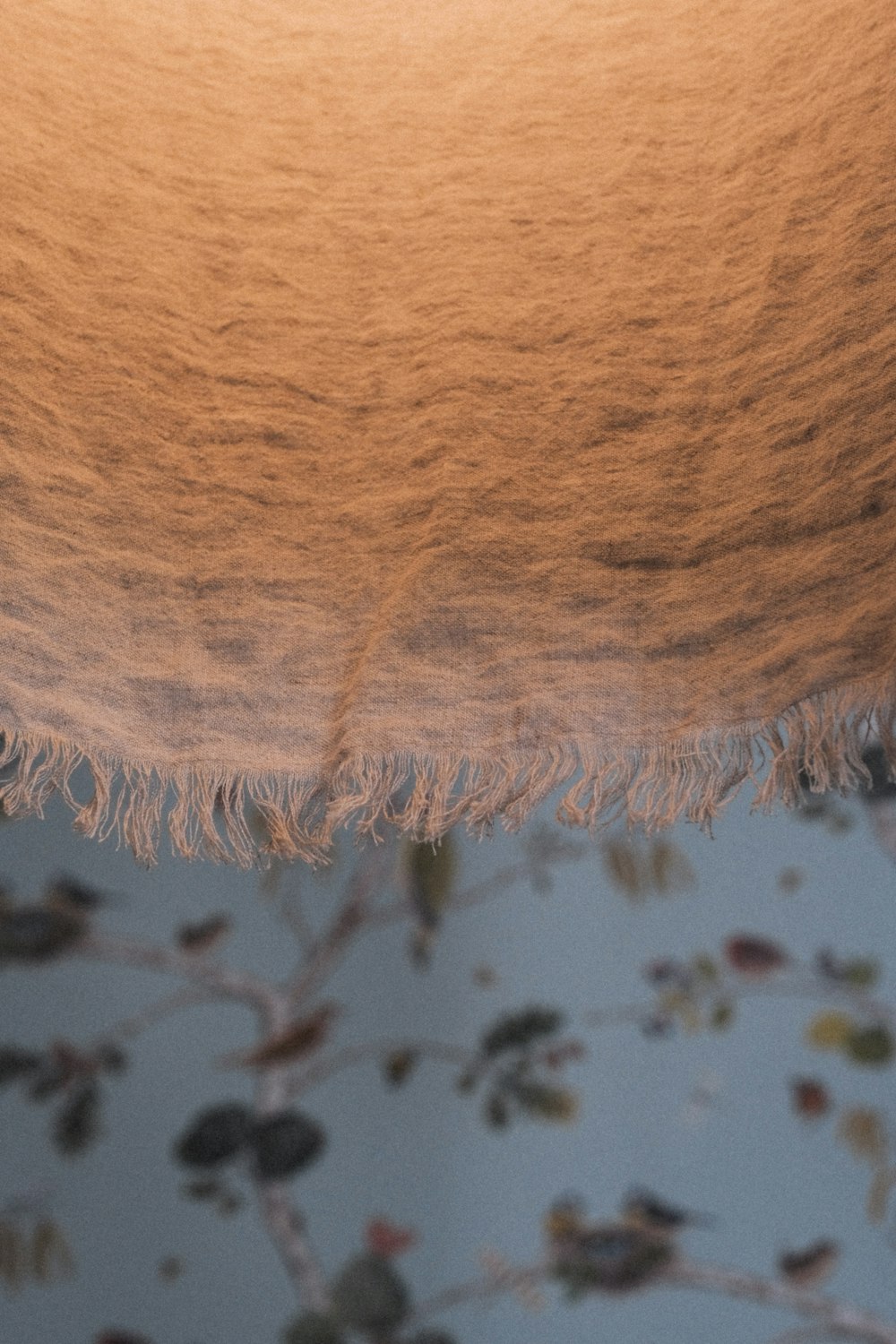 a close up of a blanket on a bed
