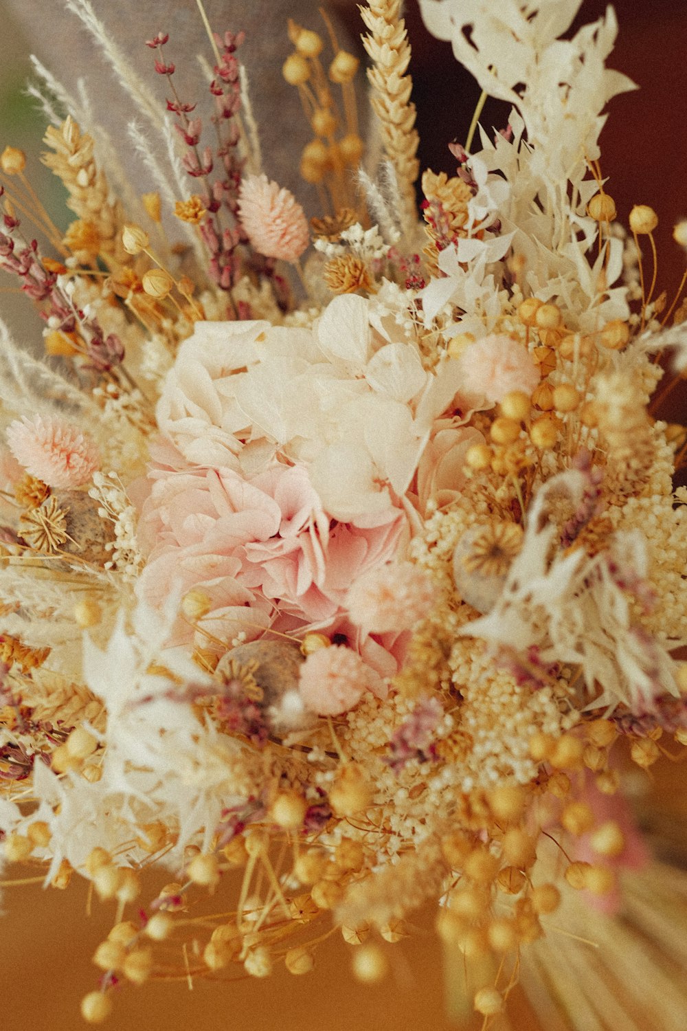 a close up of a bouquet of flowers on a table