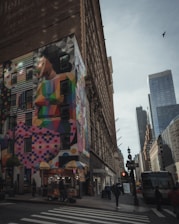 A vibrant street scene in a Black American city featuring local food vendors and cultural murals.