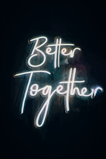 a neon sign that says better together