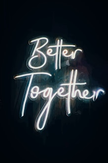 a neon sign that says better together