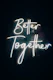a neon sign that says better together