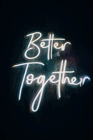 a neon sign that says better together signifying team work in consultation and supervision 