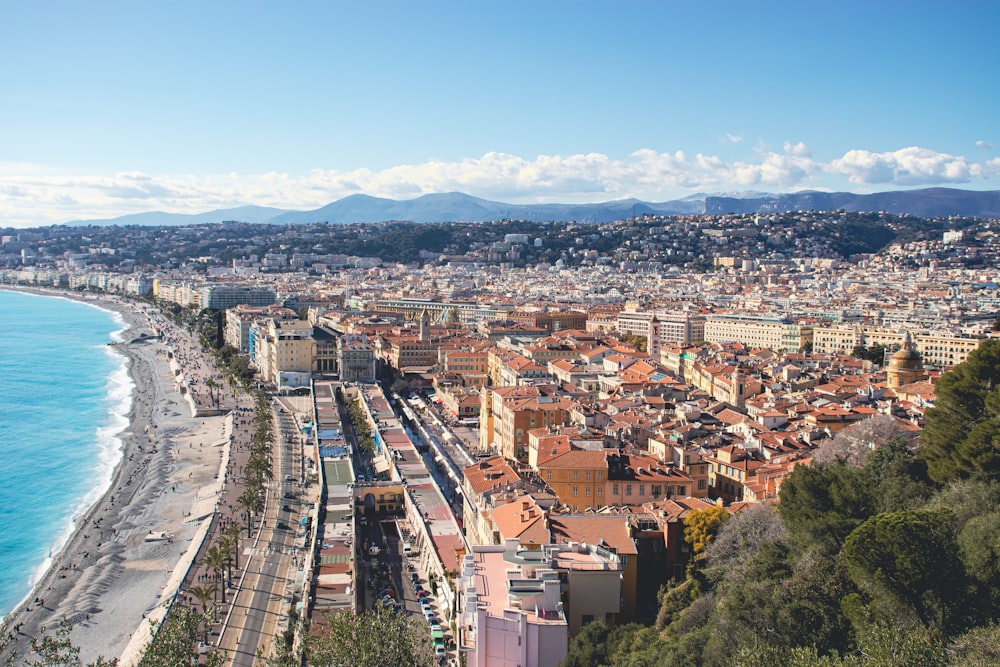 a view of a city next to the ocean