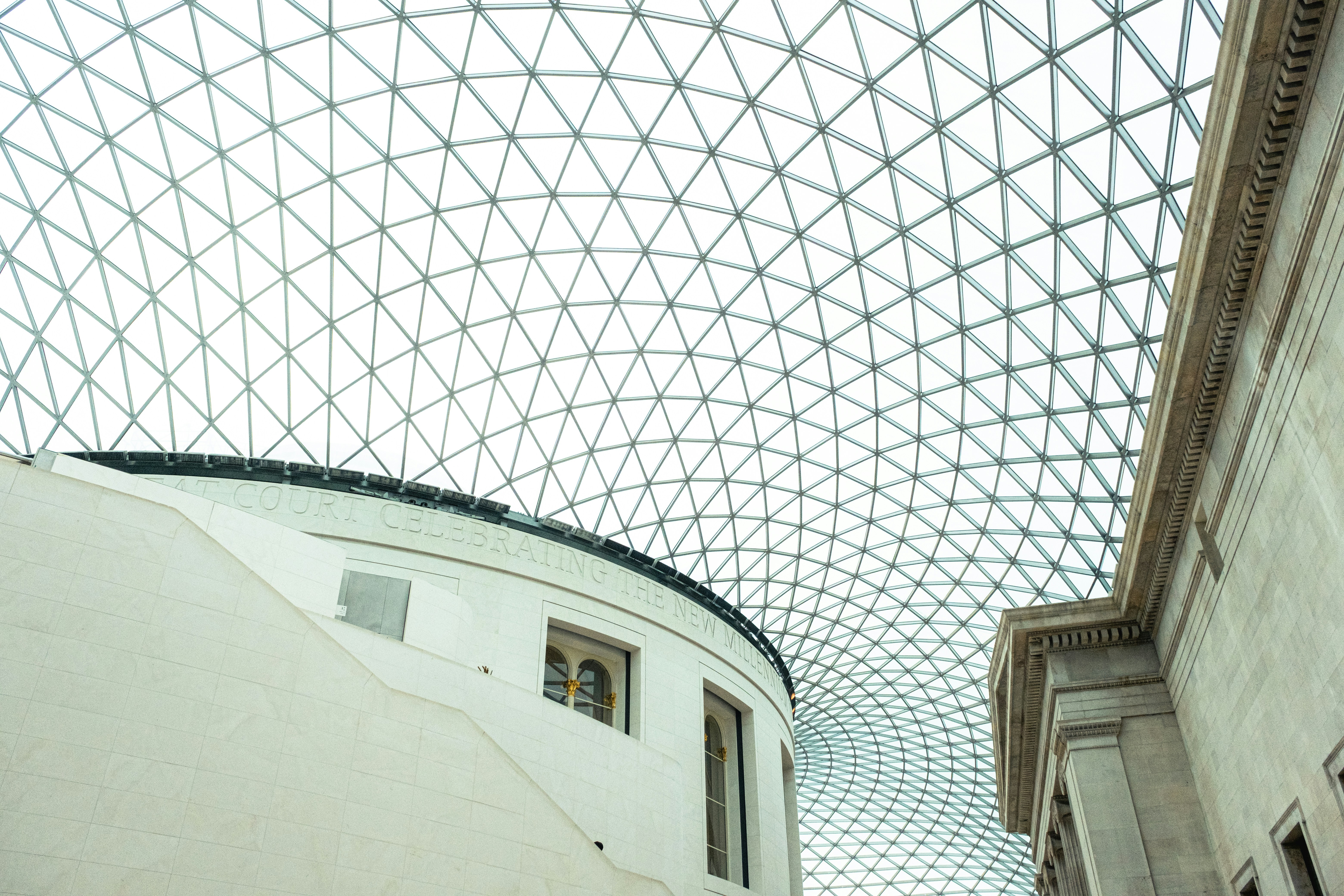 the ceiling of a building with a glass roof