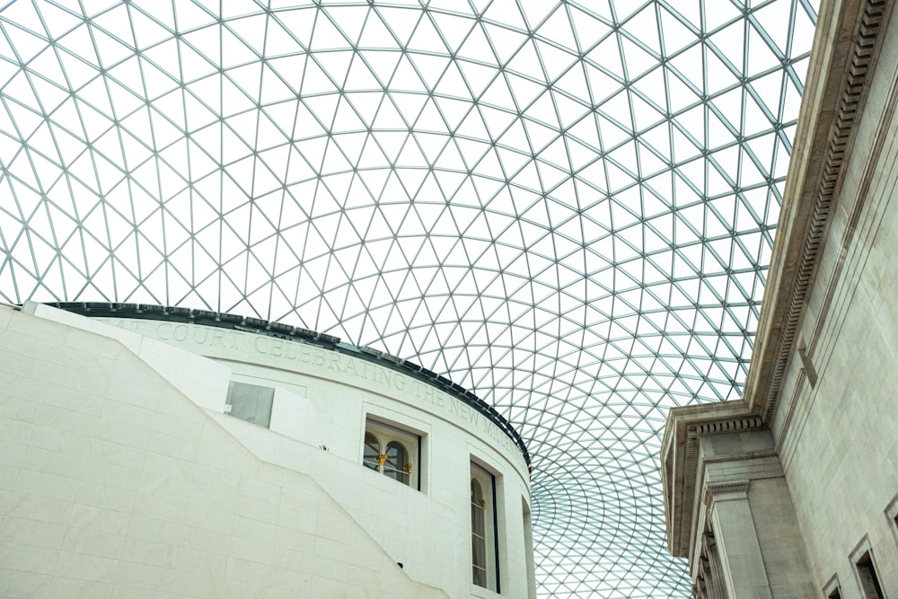 the ceiling of a building with a glass roof