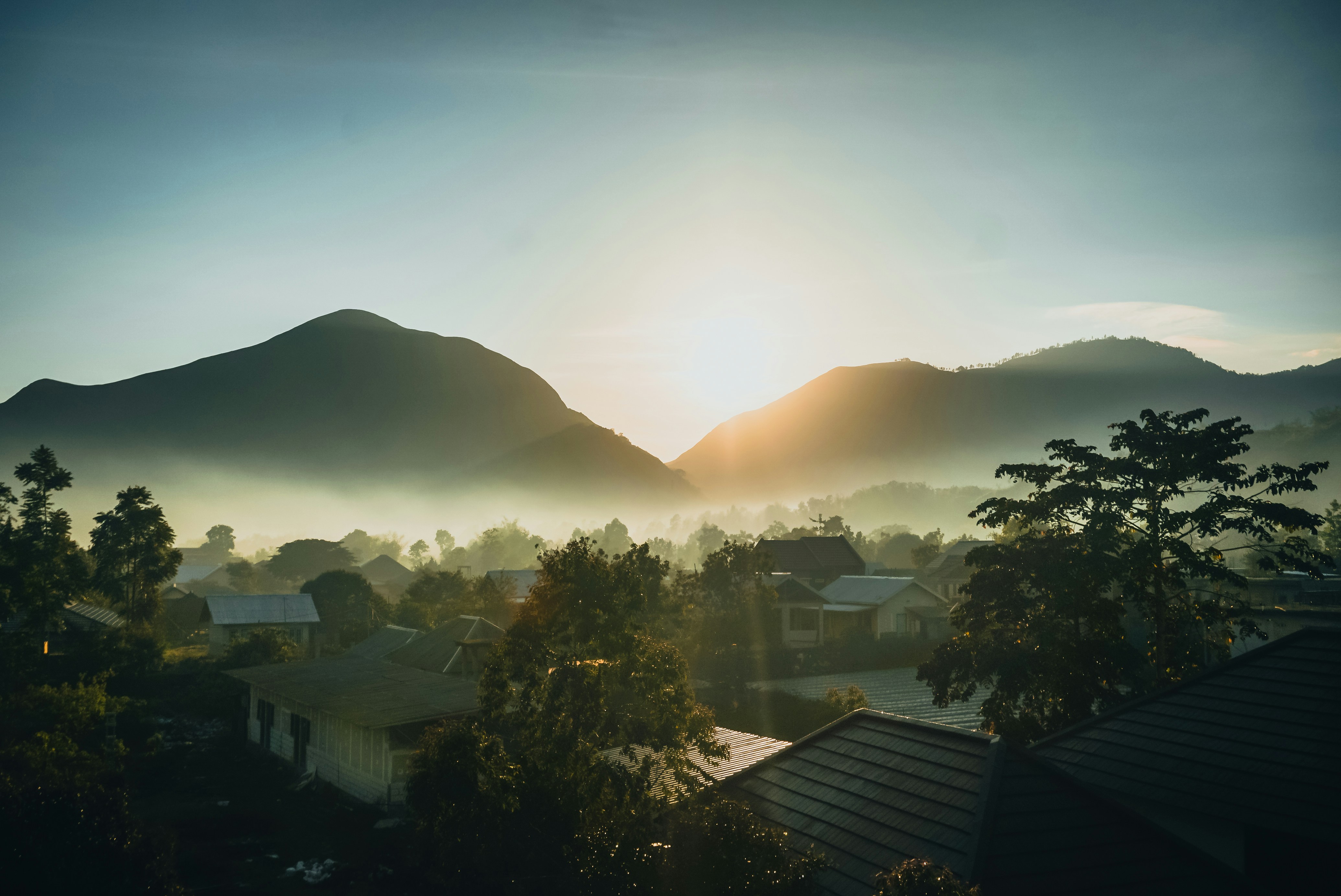 Sembalun, Indonesia - Beautiful sunrise scenery at the foot of Mount Rinjani. The fogs add a more 