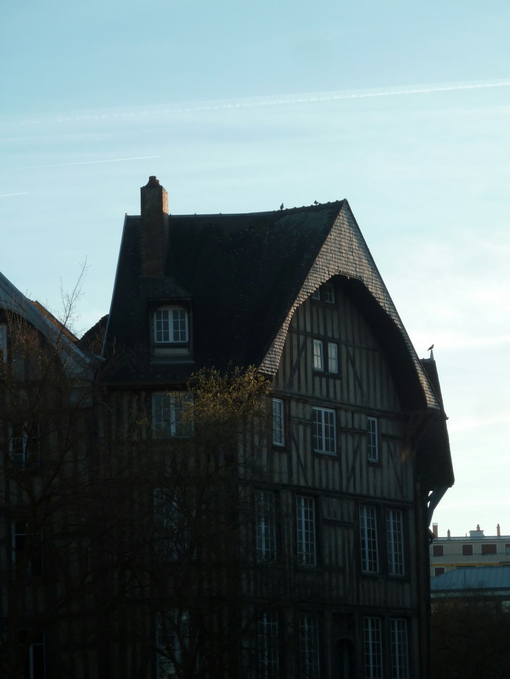 a large building with a clock on the front of it