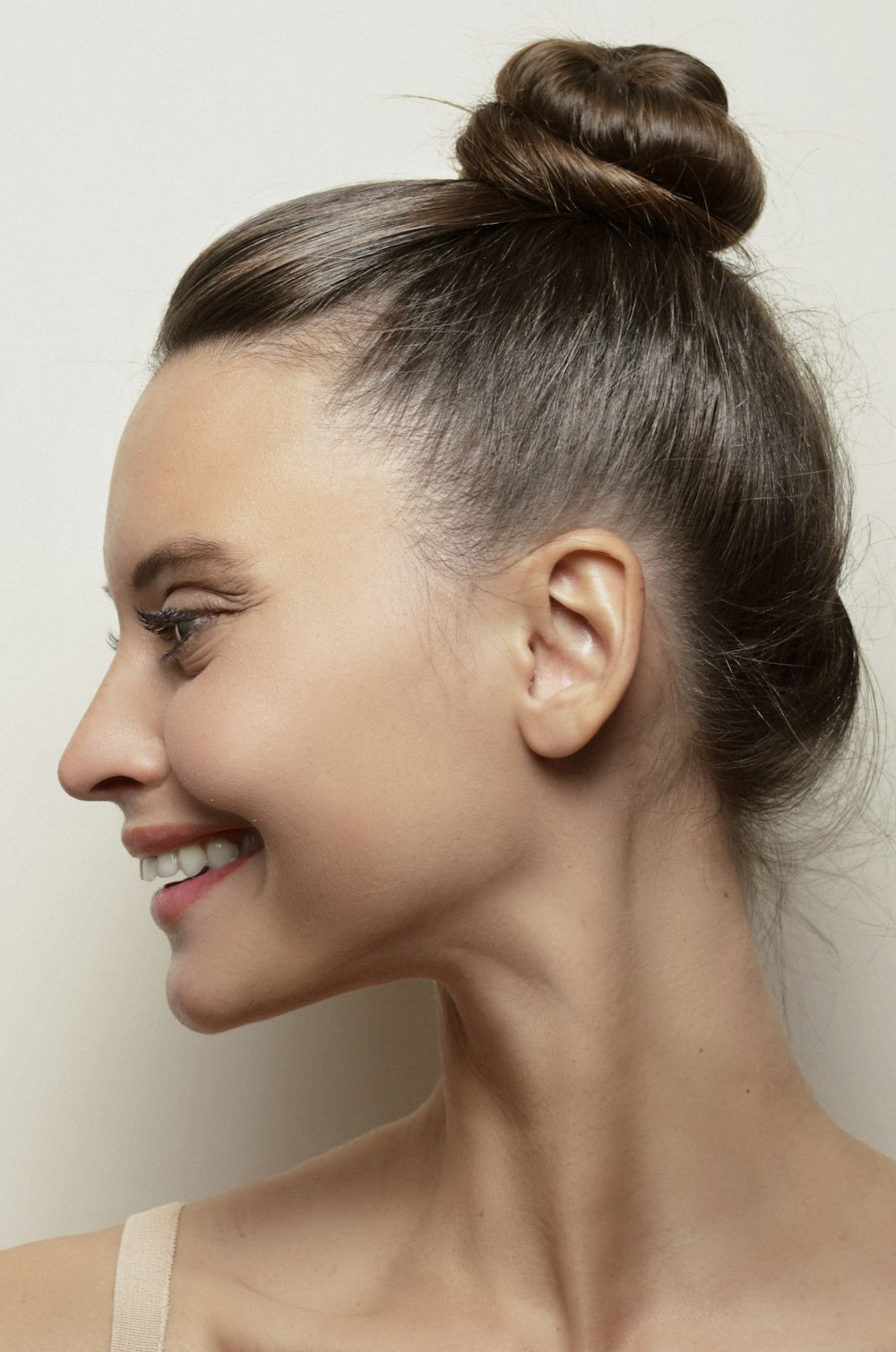 a woman with a bun in her hair