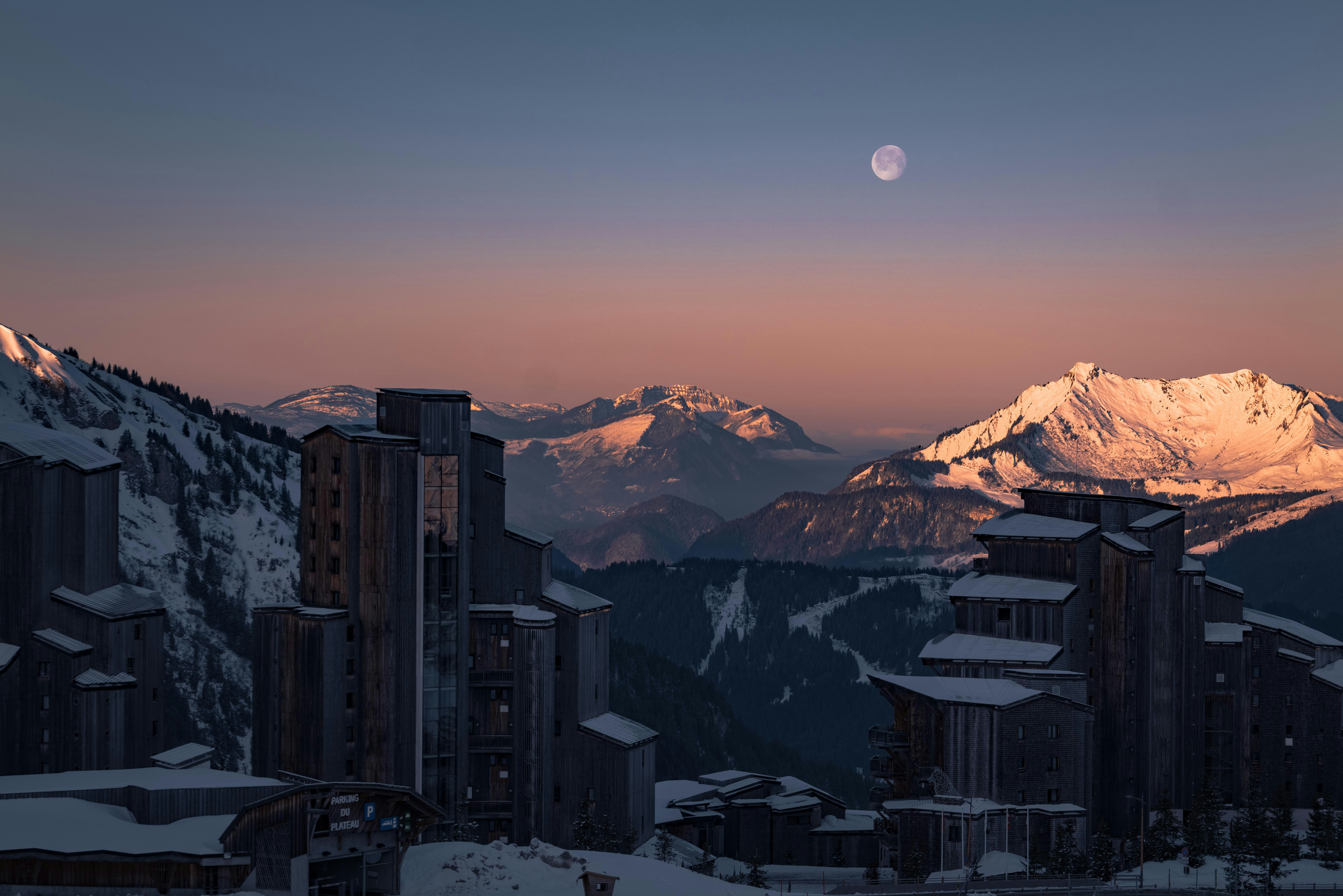 a view of a city with mountains in the background