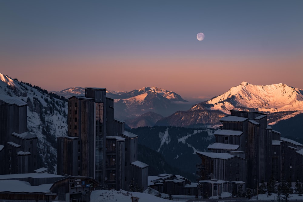 a view of a city with mountains in the background