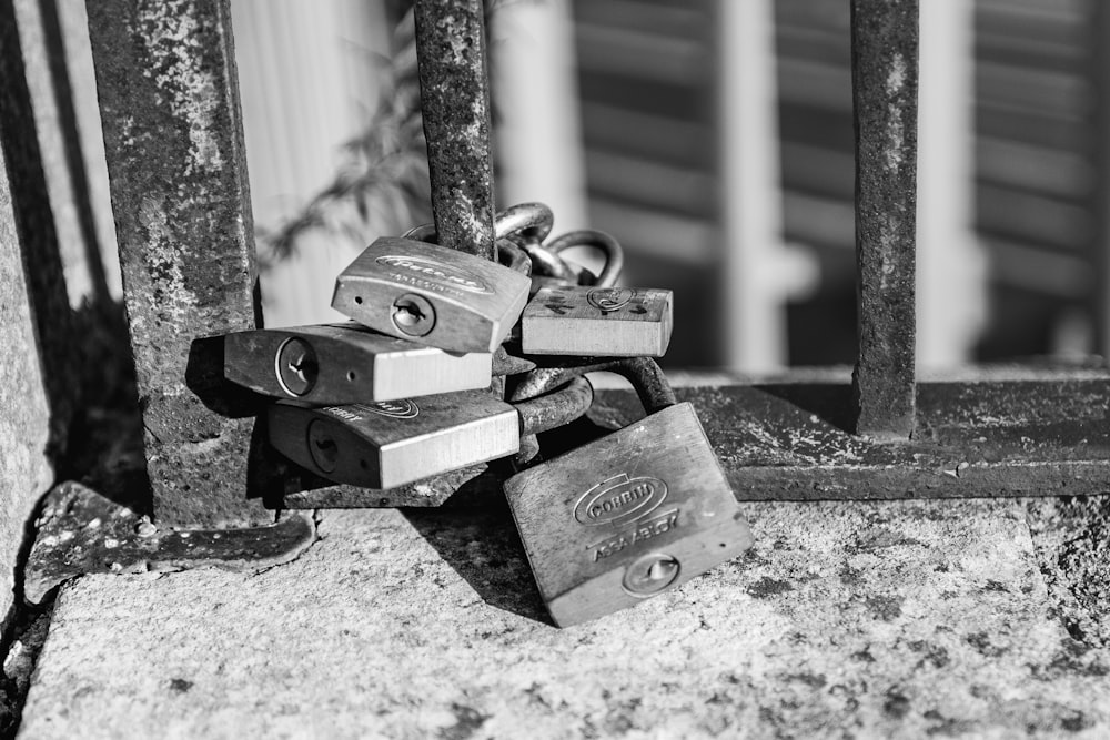 a bunch of locks that are on a gate