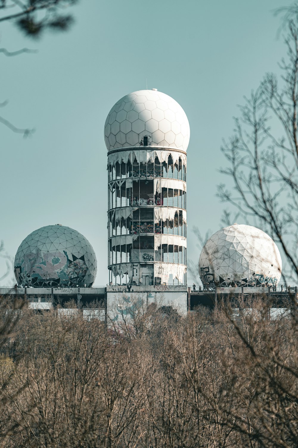 a very tall building with some very big domes on top of it