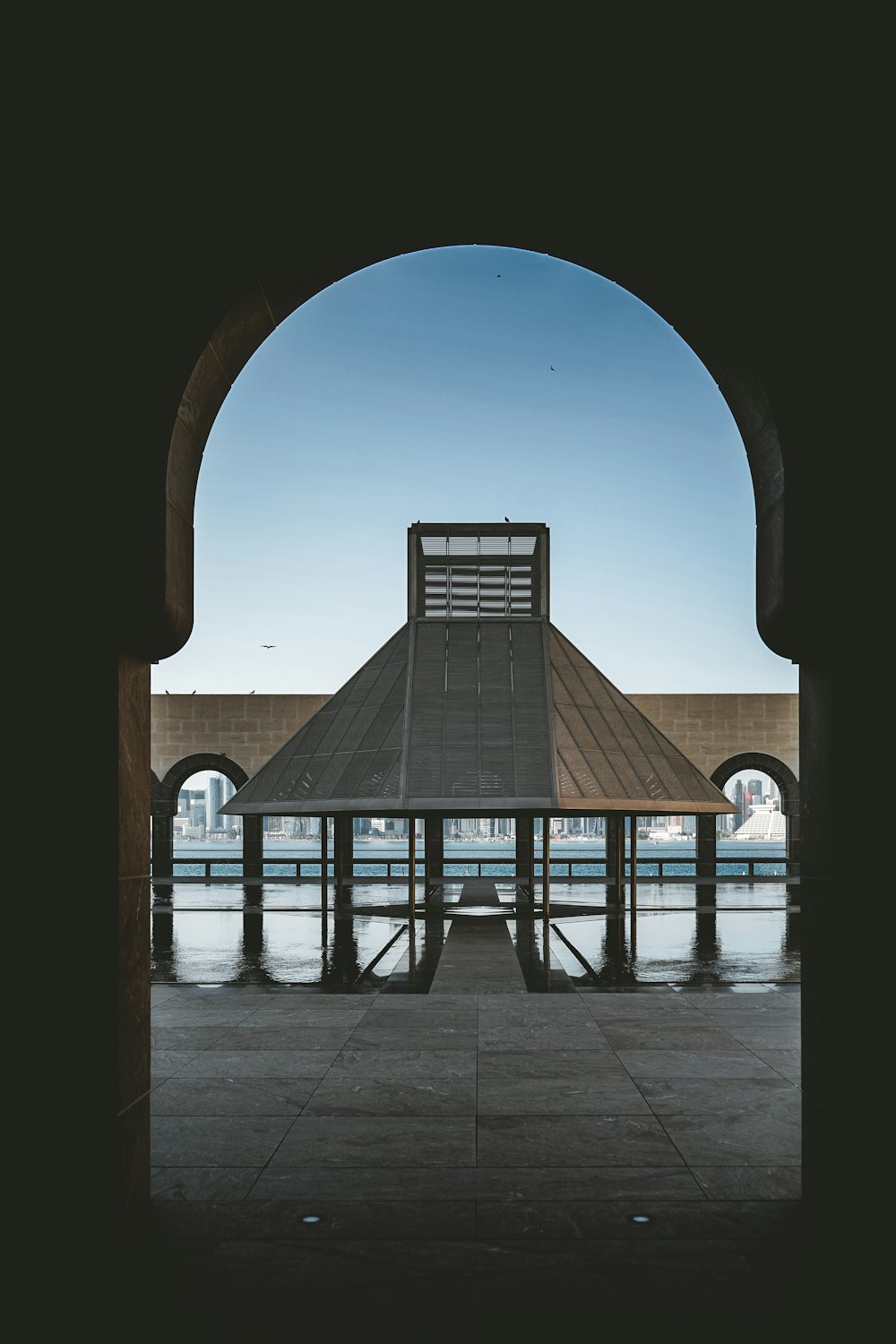 a view of a building through an archway