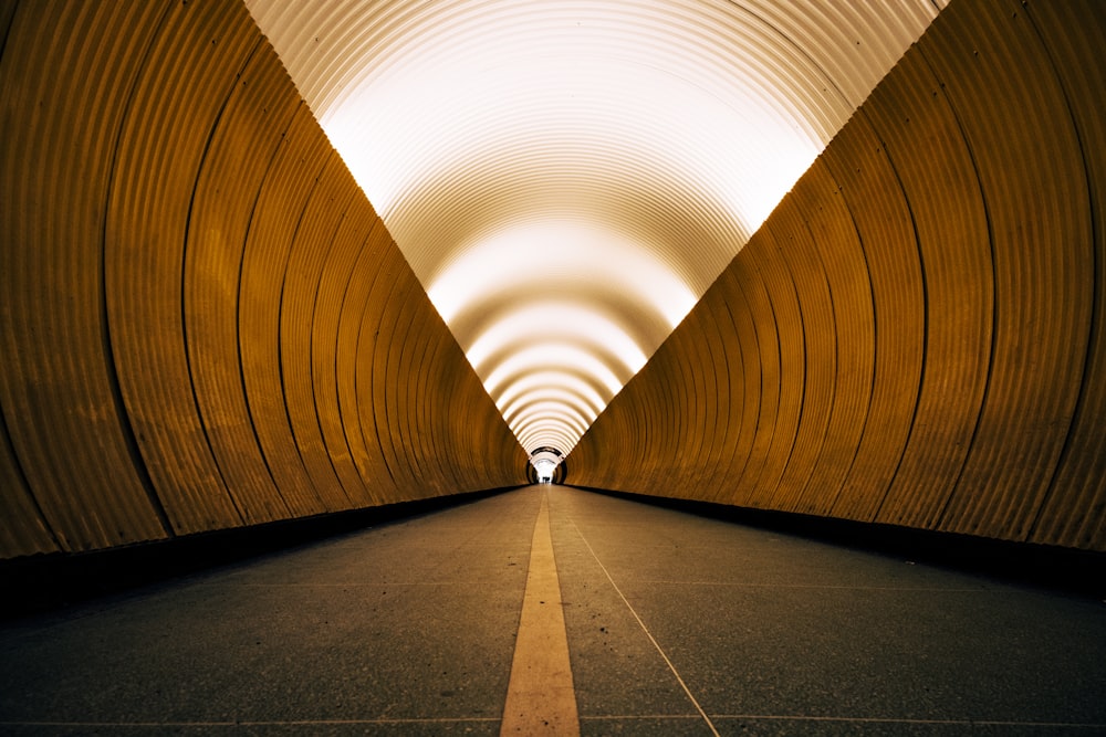 a long tunnel with a light at the end