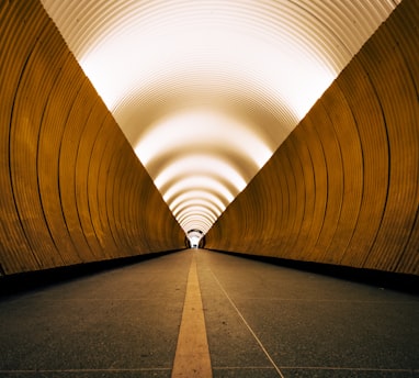 a long tunnel with a light at the end