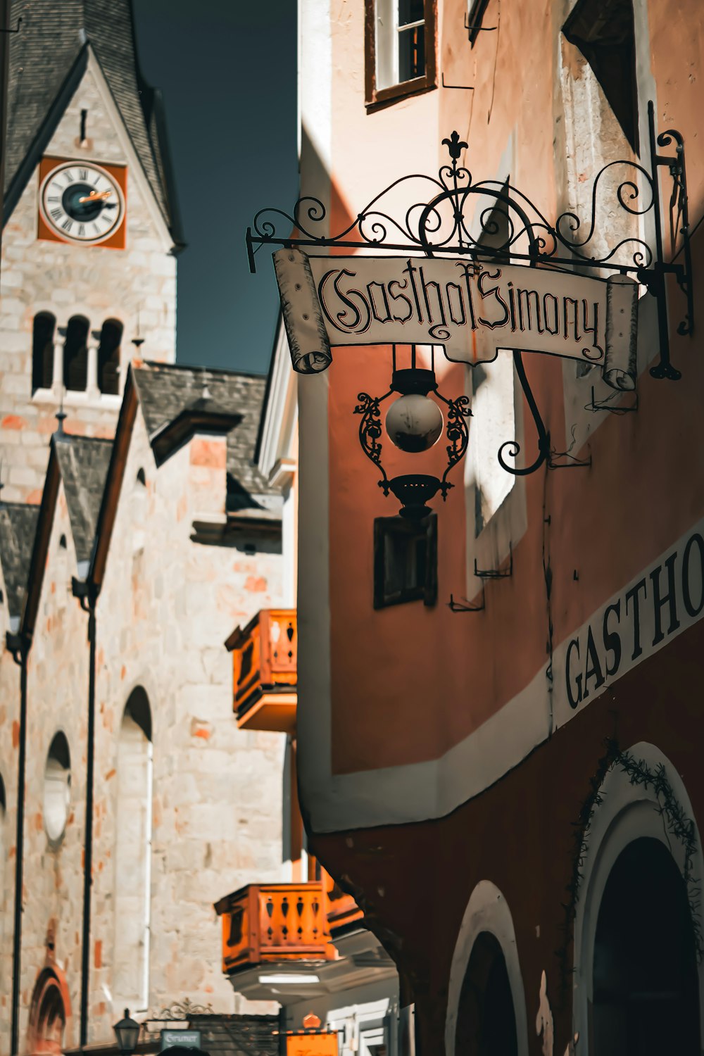 a building with a clock tower in the background