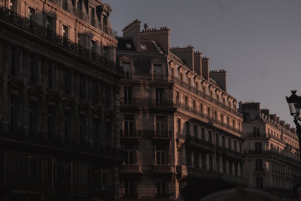 a row of tall buildings next to each other