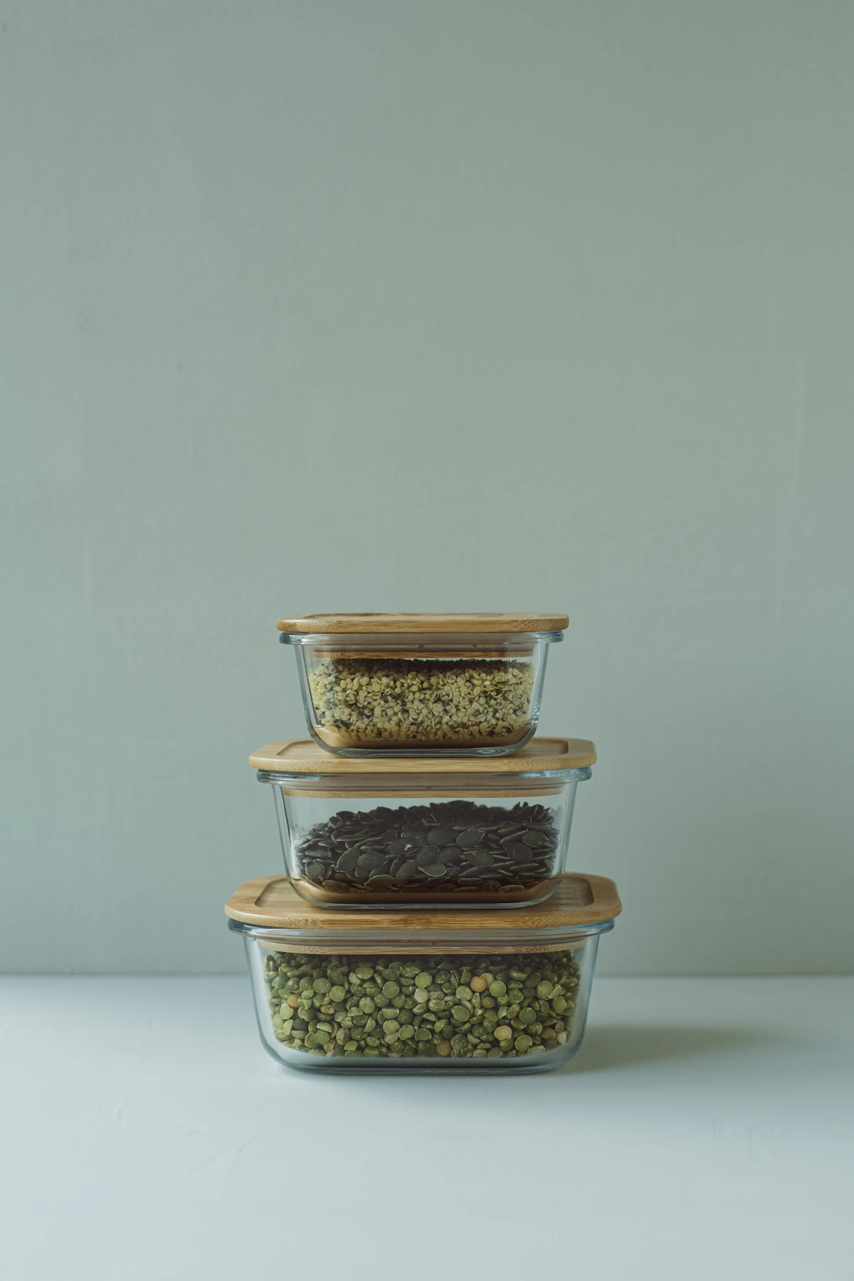 Glass meal prep containers filled with food